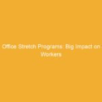 Text on a yellow background stating 'Office Stretch Programs: Big Impact on Workers'.
