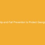 A yellow sign displaying the text 'Slip-and-Fall Prevention to Protect Georgia'.