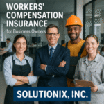 Group of four professionals, including a businessman and three workers, posing for a photo in an office setting.